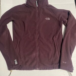 The North Face Purple Ski Jacket with Fleece Material and High Collar
